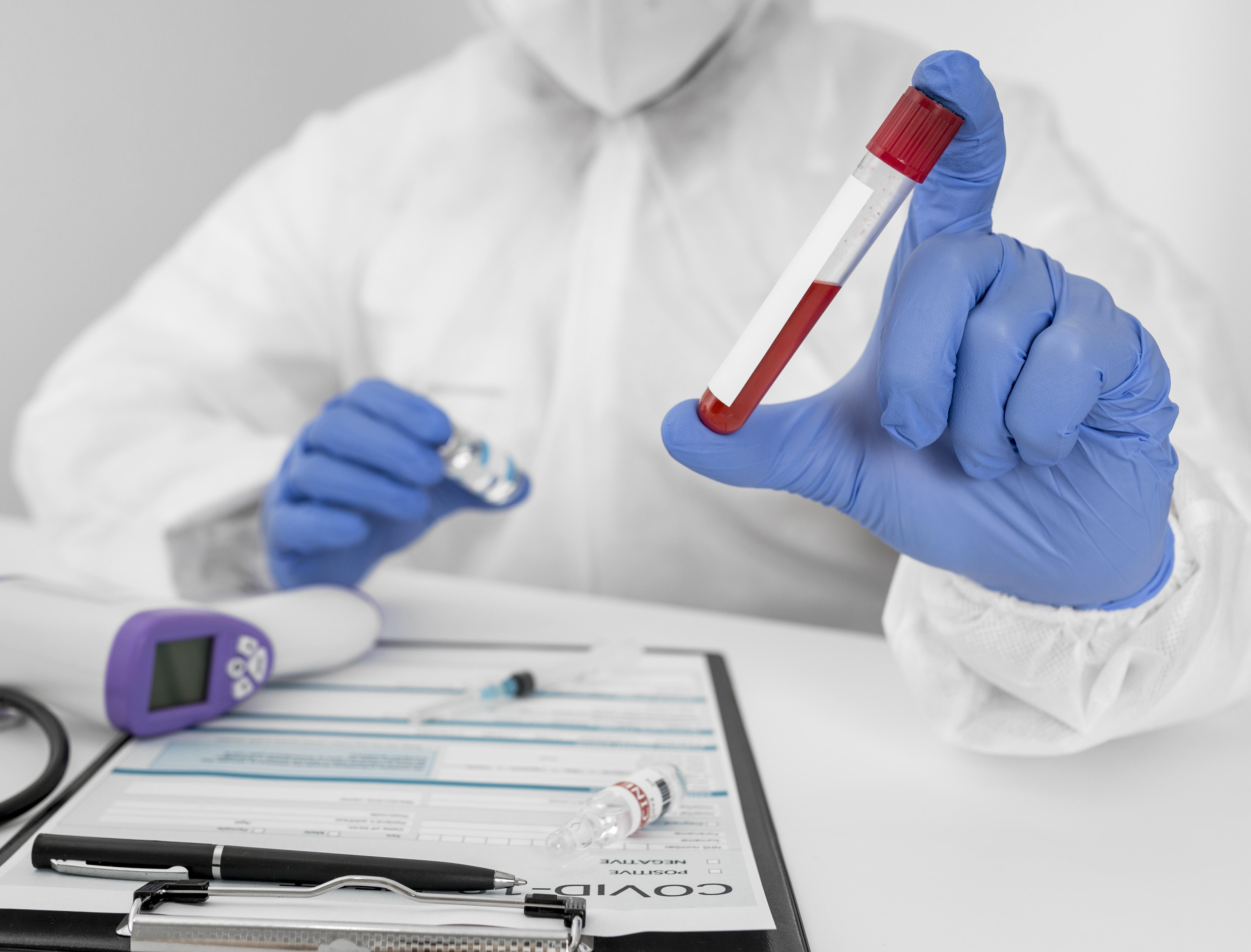 close up doctor holding covid sample