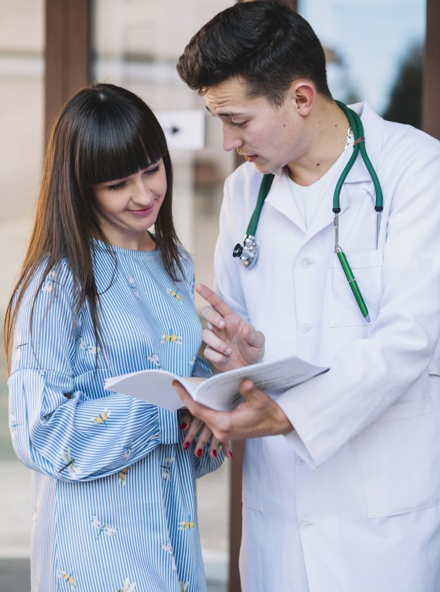 medic patient reading papers